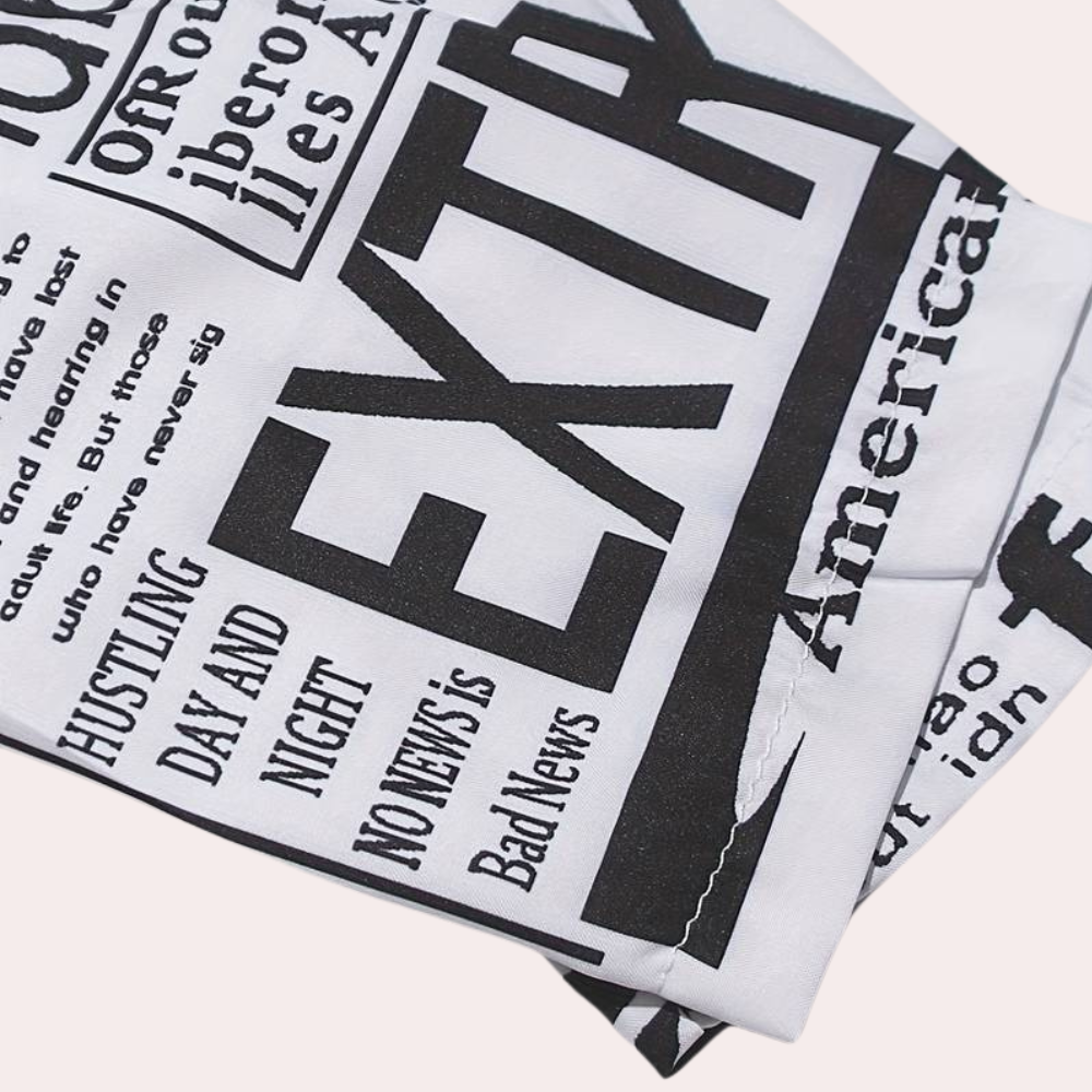 Antonia - Luxe Summer Dress with Artistic Newspaper Print